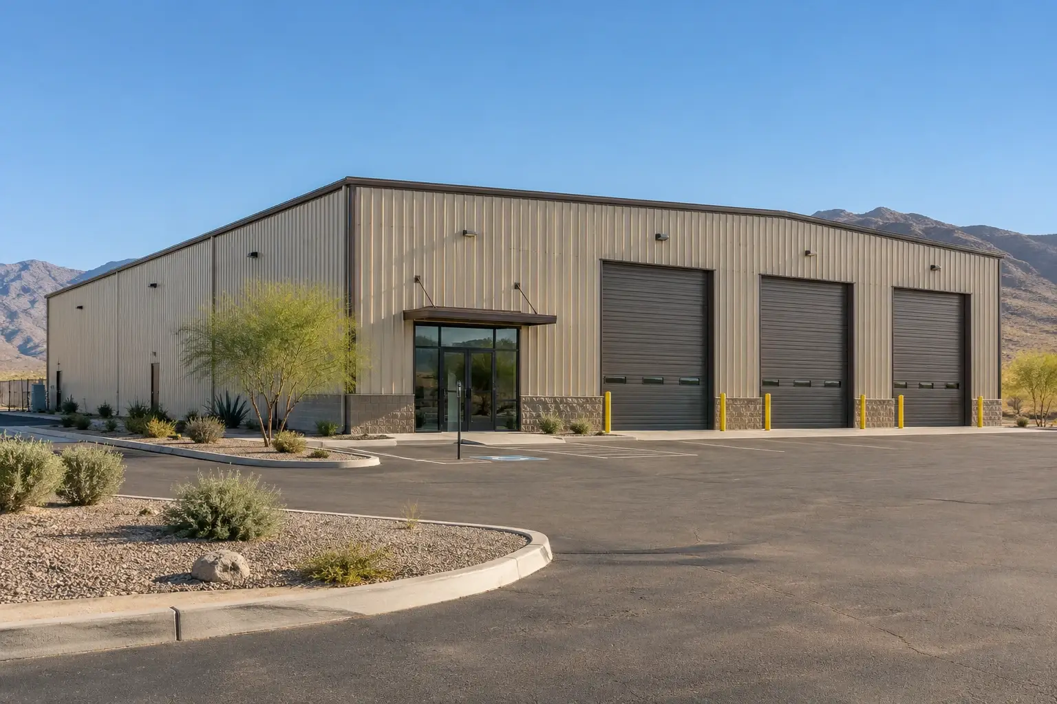 Tan commercial metal service building with three bays concept